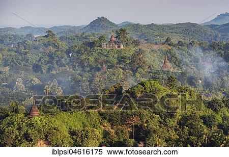 Stock Photography - Hills and stupas of Mrauk U as seen from Shwetaung Pagoda at sunrise, Burma, Myanmar, Asia. Fotosearch