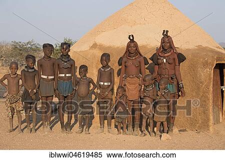 Himba women and children in front of a mud hut, Kaokoveld, Kunene, Namibia, Africa View Large Photo Image Stock Photography - Himba women and children in front of a mud hut, Kaokoveld, Kunene, Namibia, Africa. Fotosearch