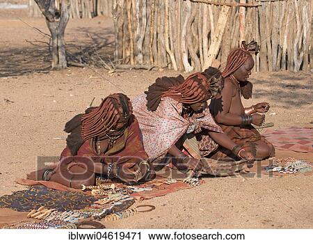 Himba women sell jewelry, Kaokoveld, Namibia, Africa View Large Photo Image Stock Image - Himba women sell jewelry, Kaokoveld, Namibia, Africa. Fotosearch