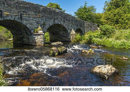 Historic bridge over the East Dart River, Postbridge, Dartmoor National Park, Devon, England, Great Britain View Large Photo Image Stock Photograph - Historic bridge over the East Dart River, Postbridge, Dartmoor National Park, Devon, England, Great Britain. Fotosearch