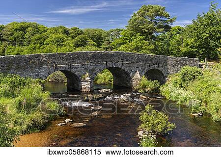 Historic bridge over the East Dart River, Postbridge, Dartmoor National Park, Devon, England, Great Britain View Large Photo Image Stock Photography - Historic bridge over the East Dart River, Postbridge, Dartmoor National Park, Devon, England, Great Britain. Fotosearch