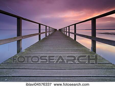 Holzsteg, at Morgenrot, Plauer See, Plau am See, Mecklenburg-Western Pomerania, Germany, Europe View Large Photo Image Stock Photo - Holzsteg, at Morgenrot, Plauer See, Plau am See, Mecklenburg-Western Pomerania, Germany, Europe. Fotosearch
