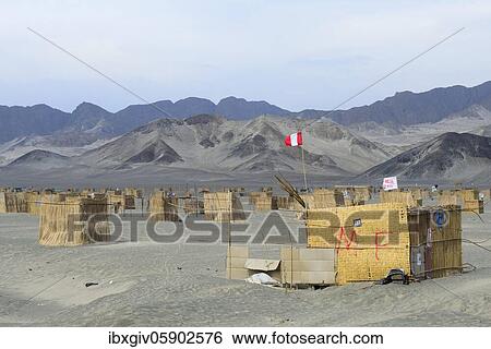 Stock Photograph - Huts of squatters, illegal settlers along the Panamericana, near Chimbote, Ancash Region, Peru, South America. Fotosearch