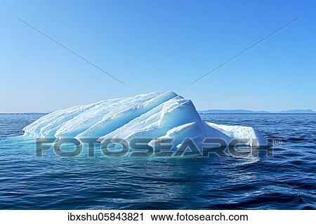 Stock Image - Iceberg drifts through Icefjord, UNESCO World Heritage Site, Disko Bay, Ilulissat, West Greenland, Greenland, North America. Fotosearch