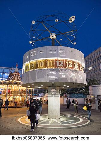 Illuminated world time clock at the blue hour, Berlin, Germany, Europe View Large Photo Image Stock Photography - Illuminated world time clock at the blue hour, Berlin, Germany, Europe. Fotosearch