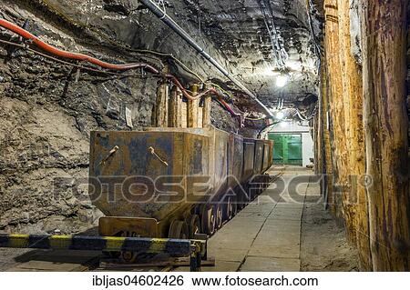 Stock Photograph - Industrial metal wagon in underground tunnel of salt mine, Bochnia, Poland, Europe. Fotosearch