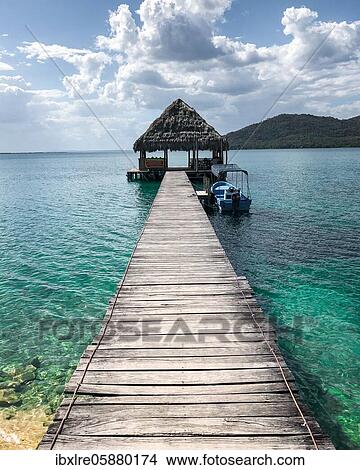 Jetty with water hut, Lago Peten Itza, Guatemala, Central America View Large Photo Image Picture - Jetty with water hut, Lago Peten Itza, Guatemala, Central America. Fotosearch