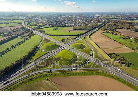 Stock Photo - Kamener Kreuz, motorway intersection A1 and A2, motorway A2, tangent, classic cloverleaf, Kamen, Ruhr Area, North Rhine-Westphalia, Germany, Europe. Fotosearch