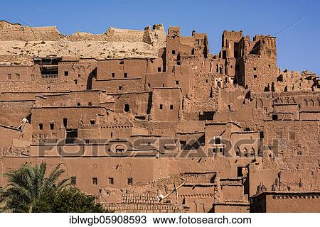 Stock Image - Kasbah Ait Benhaddou, largest Berber fortress, fortified Berber village, Ksar with clay castles, Kasbahs, Tighremt, South Morocco, Morocco, Africa. Fotosearch