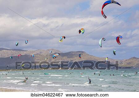 Kitesurfing on sea waves, Alcudia beach, Mallorca, Balearic Islands, Spain, Europe View Large Photo Image Stock Photo - Kitesurfing on sea waves, Alcudia beach, Mallorca, Balearic Islands, Spain, Europe. Fotosearch