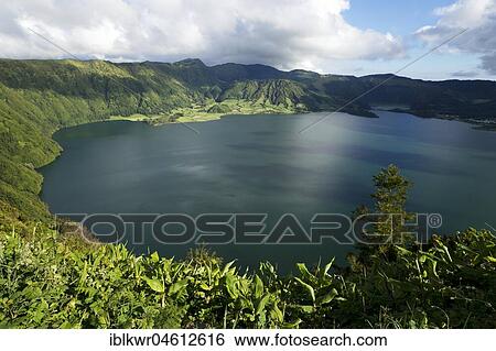 Lagoon Lagoon Lagoa Azul at the Caldeira das Sete Cidades, Sao Miguel, Azores, Portugal, Europe View Large Photo Image Stock Photograph - Lagoon Lagoon Lagoa Azul at the Caldeira das Sete Cidades, Sao Miguel, Azores, Portugal, Europe. Fotosearch
