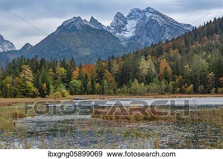 Stock Photo - Lake Taubensee with Hochkalter, Ramsau, Berchtesgadener Alps, Berchtesgadener Land, Upper Bavaria, Bavaria, Germany, Europe. Fotosearch