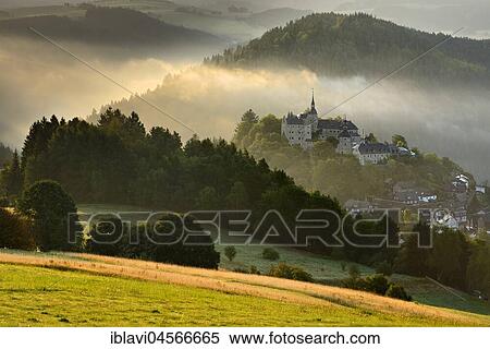 Stock Photography - Lauenstein Castle, morning light, morning fog, Ludwigsstadt, Upper Franconia, Bavaria, Germany, Europe. Fotosearch