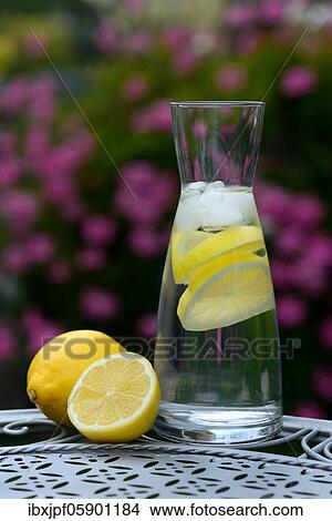 Lemon water in carafe and lemons, Germany, Europe View Large Photo Image Picture - Lemon water in carafe and lemons, Germany, Europe. Fotosearch