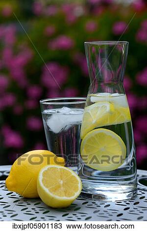 Lemon water in carafe and lemons, Germany, Europe View Large Photo Image Stock Image - Lemon water in carafe and lemons, Germany, Europe. Fotosearch