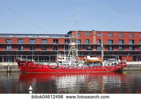 Lightship Fehmarnbelt at the Hansa harbour with Mediadocks, Lübeck, Schleswig-Holstein, Germany, Europe View Large Photo Image Stock Photo - Lightship Fehmarnbelt at the Hansa harbour with Mediadocks, Lübeck, Schleswig-Holstein, Germany, Europe. Fotosearch