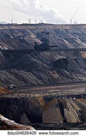 Stock Photo - Lignite opencast mine with stacker, Garzweiler, Jüchen, Rheinische Braunkohlerevier, North Rhine-Westphalia, Germany, Europe. Fotosearch