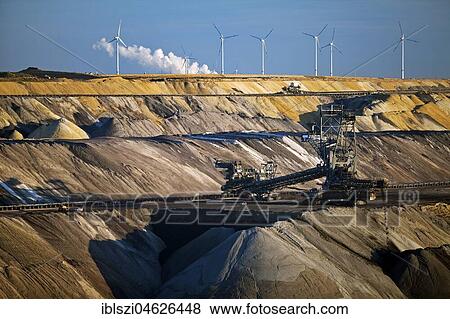 Lignite opencast mine with stacker, Garzweiler, Jüchen, Rheinische Braunkohlerevier, North Rhine-Westphalia, Germany, Europe View Large Photo Image Stock Photo - Lignite opencast mine with stacker, Garzweiler, Jüchen, Rheinische Braunkohlerevier, North Rhine-Westphalia, Germany, Europe. Fotosearch