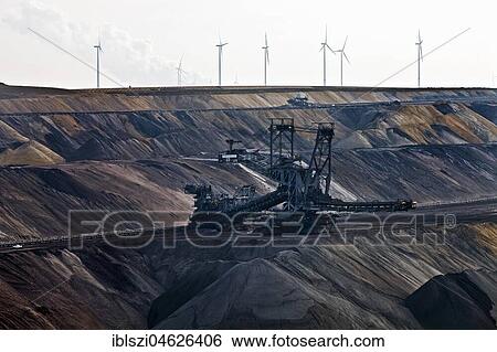 Lignite opencast mine with stacker, Garzweiler, Jüchen, Rheinische Braunkohlerevier, North Rhine-Westphalia, Germany, Europe View Large Photo Image Stock Photograph - Lignite opencast mine with stacker, Garzweiler, Jüchen, Rheinische Braunkohlerevier, North Rhine-Westphalia, Germany, Europe. Fotosearch