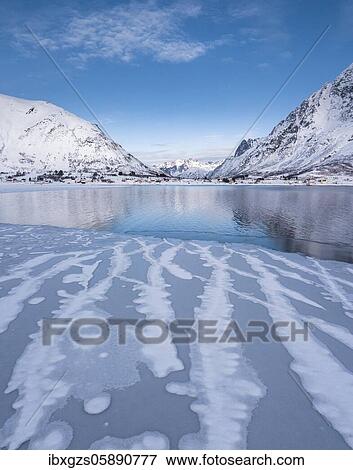 Lines on ice on a fjord, behind blue sea and mountains, Nordland, Lofoten, Norway, Europe View Large Photo Image Stock Photo - Lines on ice on a fjord, behind blue sea and mountains, Nordland, Lofoten, Norway, Europe. Fotosearch