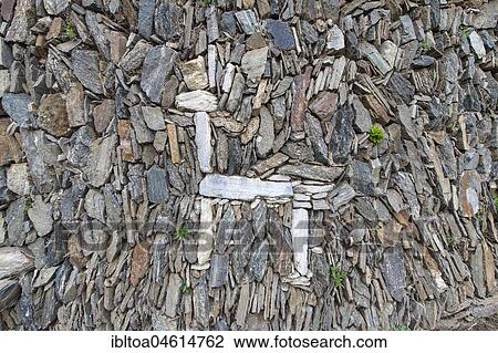 Stock Image - Llama figure in an old stone wall, partly excavated ruined city of the Inca, Choquequirao, Peru, South America. Fotosearch