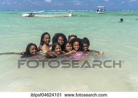 Local children bathing on the beach of Saint Francois, Rodrigues Island, Mauritius, Africa View Large Photo Image Stock Image - Local children bathing on the beach of Saint Francois, Rodrigues Island, Mauritius, Africa. Fotosearch