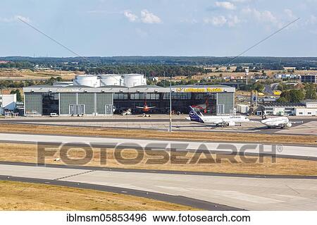 Lufthansa Technik Hangar Aircraft Berlin Brandenburg Airport BER Aerial photograph, Berlin, Germany, Europe View Large Photo Image Stock Photograph - Lufthansa Technik Hangar Aircraft Berlin Brandenburg Airport BER Aerial photograph, Berlin, Germany, Europe. Fotosearch