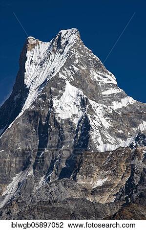 Stock Image - Machapuchare, Himalaya, fish tail, 6997m, holy mountain, Mardi Himal, Annapurna region, Nepal, Asia. Fotosearch