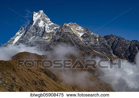 Stock Photography - Machapuchare, Himalaya, fish tail, 6997m, holy mountain, Mardi Himal, Annapurna region, Nepal, Asia. Fotosearch