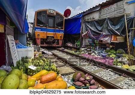 Stock Photography - Maeklong Railway Market, Bangkok, Thailand, Asia. Fotosearch