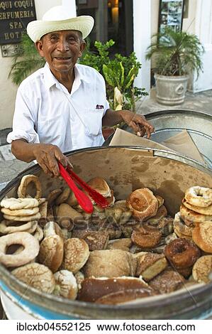 Man, 82 years old, sells traditional biscuits, Valladolid, Yucatán, Mexico, Central America View Large Photo Image Stock Photography - Man, 82 years old, sells traditional biscuits, Valladolid, Yucatán, Mexico, Central America. Fotosearch