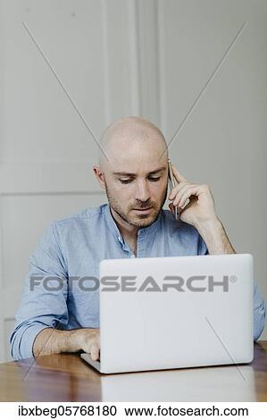 Stock Image - Man at home office. Fotosearch