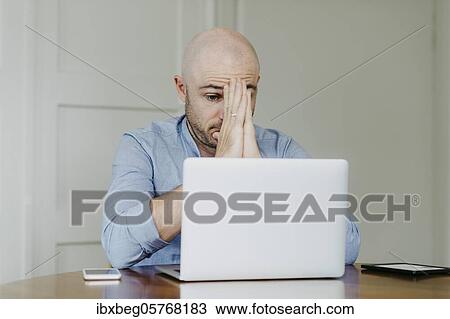 Stock Image - Man at home office. Fotosearch