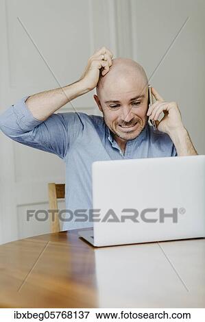 Man at home office View Large Photo Image Stock Photo - Man at home office. Fotosearch