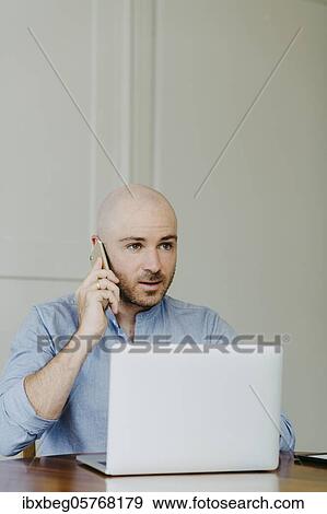 Man at home office View Large Photo Image Stock Photo - Man at home office. Fotosearch
