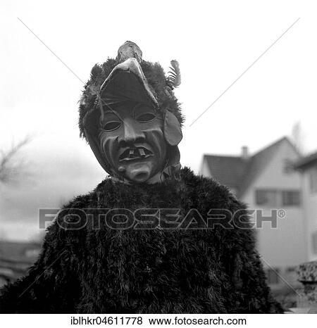 Man with mask, carnival, around 1950, surroundings of Freiburg, Germany, Europe View Large Photo Image Stock Photo - Man with mask, carnival, around 1950, surroundings of Freiburg, Germany, Europe. Fotosearch