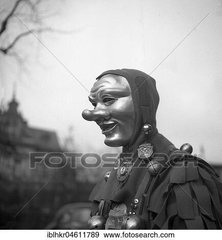 Man with mask, carnival, around 1950, surroundings of Freiburg, Germany, Europe View Large Photo Image Stock Photo - Man with mask, carnival, around 1950, surroundings of Freiburg, Germany, Europe. Fotosearch
