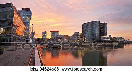 Stock Photograph - Media harbour at sunset, Düsseldorf, North Rhine-Westphalia, Germany, Europe. Fotosearch