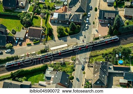 Millingen railway crossing main road with regional train, Betuweline, Rees, Lower Rhine, Rhine, North Rhine-Westphalia, Germany, Europe View Large Photo Image Stock Image - Millingen railway crossing main road with regional train, Betuweline, Rees, Lower Rhine, Rhine, North Rhine-Westphalia, Germany, Europe. Fotosearch