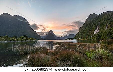Mitre Peak, reflection in water, sunset, Milford Sound, Fiordland National Park, Te Anau, Southland, South Island, New Zealand, Oceania View Large Photo Image Picture - Mitre Peak, reflection in water, sunset, Milford Sound, Fiordland National Park, Te Anau, Southland, South Island, New Zealand, Oceania. Fotosearch
