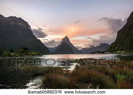 Mitre Peak, reflection in water, sunset, Milford Sound, Fiordland National Park, Te Anau, Southland, South Island, New Zealand, Oceania View Large Photo Image Stock Photograph - Mitre Peak, reflection in water, sunset, Milford Sound, Fiordland National Park, Te Anau, Southland, South Island, New Zealand, Oceania. Fotosearch