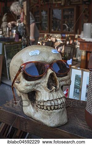 Stock Photo - Money box as skull, Auer Dult, Munich, Upper Bavaria, Bavaria, Germany, Europe. Fotosearch