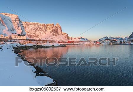 Stock Photo - Morning light in the winter fishing village of reine, Reine, Nordland, Lofoten, Norway, Europe. Fotosearch