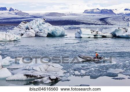 Motorboat in glacier lagoon Jökulsárlón, glacier tongue of Vatnajökull Glacier, Vatnajökull National Park, Hornarfjoerdur, East Iceland, Iceland, Europe View Large Photo Image Stock Image - Motorboat in glacier lagoon Jökulsárlón, glacier tongue of Vatnajökull Glacier, Vatnajökull National Park, Hornarfjoerdur, East Iceland, Iceland, Europe. Fotosearch