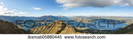 Stock Photography - Mountain and lake views from Mount Roy, Roys Peak, Panorama, Lake Wanaka, Southern Alps, Otago, South Island, New Zealand, Oceania. Fotosearch