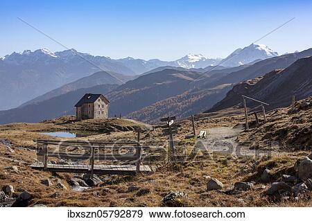 Mountain hut Sesvenna in front of an alpine panorama with Ortler, South Tyrol, Italy, Europe View Large Photo Image Stock Photo - Mountain hut Sesvenna in front of an alpine panorama with Ortler, South Tyrol, Italy, Europe. Fotosearch