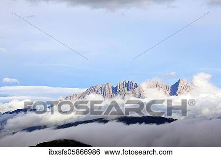 Mountain massif rose garden above the haze in the valley, Dolomites, South Tyrol, Italy, Europe View Large Photo Image Stock Photograph - Mountain massif rose garden above the haze in the valley, Dolomites, South Tyrol, Italy, Europe. Fotosearch