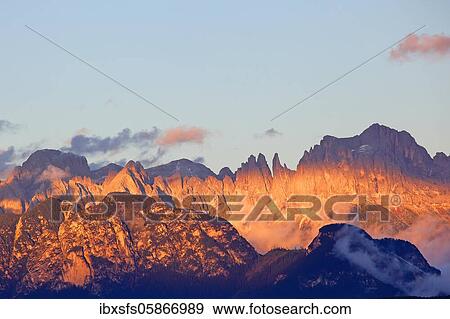 Stock Photo - Mountain massif rose garden in the evening light, Dolomites, South Tyrol, Italy, Europe. Fotosearch
