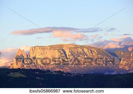 Mountain massif Schlern in the evening light, Dolomites, South Tyrol, Italy, Europe View Large Photo Image Stock Photo - Mountain massif Schlern in the evening light, Dolomites, South Tyrol, Italy, Europe. Fotosearch