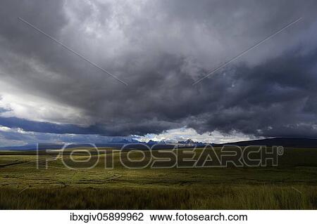 Mountain range of the Cordillera Blanca under dark clouds, Ruta 110, near Chavín de Huántar, Ancash region, Peru, South America View Large Photo Image Stock Image - Mountain range of the Cordillera Blanca under dark clouds, Ruta 110, near Chavín de Huántar, Ancash region, Peru, South America. Fotosearch